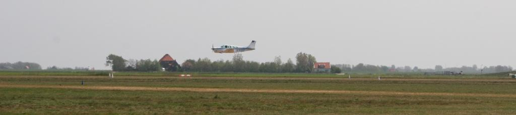 Bonanza G-FOZZ low pass over Texel airfield